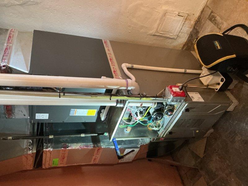 Completed prepaid HVAC maintenance visit on a residential system with a 10+ year old furnace located in the basement and air handler installed in the attic space. Performed comprehensive inspection of both heating and cooling equipment, verified operational status of all components, and documented system conditions with photographs. All equipment found to be functioning properly at time of service.