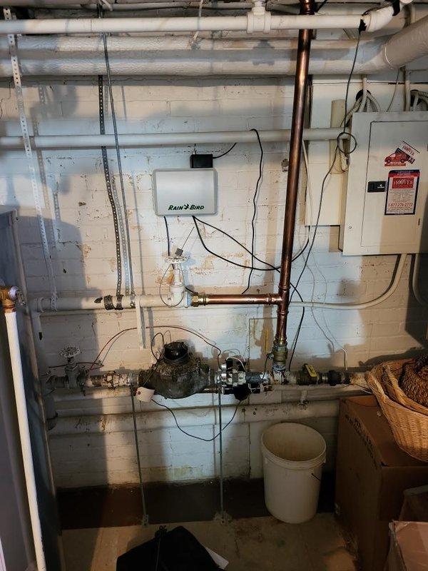 Responded to customer report of boiler leak suspected at heat exchanger. Conducted thorough inspection of existing boiler system in basement utility area. Confirmed significant corrosion and deterioration on boiler components, with visible rust and patina indicating advanced equipment failure. Assessed plumbing connections, copper piping, and associated mechanical components. Documented current system condition with photographs showing extent of corrosion damage. Provided professional recommendation for boiler replacement and prepared detailed estimate for new boiler installation based on inspection findings.