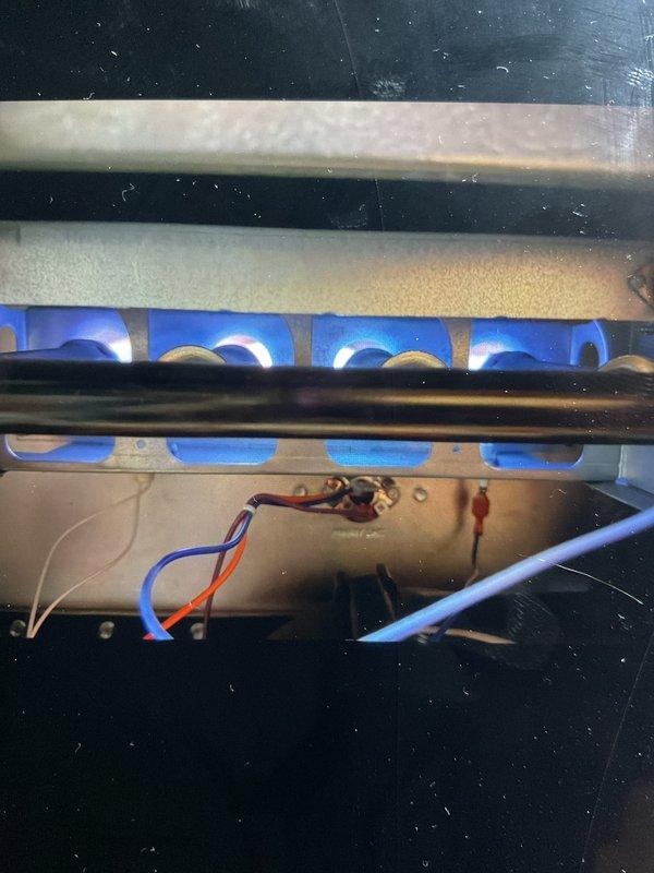 Completed comprehensive Gold furnace inspection on 5-year-old forced air heating system located in basement. Verified unit operational status with proper ignition sequence and burner flame characteristics showing consistent blue flames across all burner ports. Inspected combustion chamber components, heat exchanger, and internal wiring connections for safety and proper operation. Evaluated air filter condition, noting dust accumulation and debris buildup requiring attention for optimal airflow and system efficiency. All safety controls and operational parameters checked and confirmed within normal specifications.