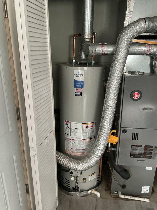 Responded to service call for no hot water and low water pressure on recently installed tanked water heater system covered under warranty. Upon inspection, identified debris and failed O-rings within faucet cartridge assembly causing restricted water flow throughout the residence. Disassembled and removed cartridge, replaced worn rubber seals and O-rings, cleared internal obstruction, and reassembled plumbing fixture. Verified proper water pressure restoration and confirmed water heater operation with adequate hot water supply to all fixtures.