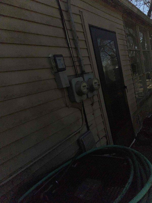 Conducted site assessment for furnace replacement estimate at residential property. Evaluated existing heating system location, confirmed natural gas fuel type, and documented exterior access points and electrical service configuration. Photographed property exterior including side yard access, utility meters, and electrical connections to prepare comprehensive replacement proposal for comfort advisor consultation.