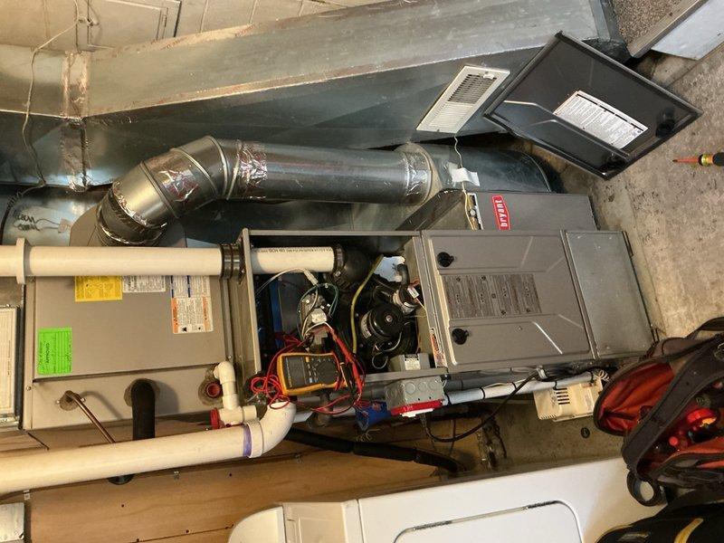Responded to no heat call on Bryant furnace installed in 2016. Upon arrival, performed diagnostic testing using multimeter to check electrical components and system operation. Opened furnace access panel and inspected internal components including blower motor, wiring, and control board. Verified condensate pump operation and drainage system functionality. System restored to proper heating operation and tested for normal cycling.