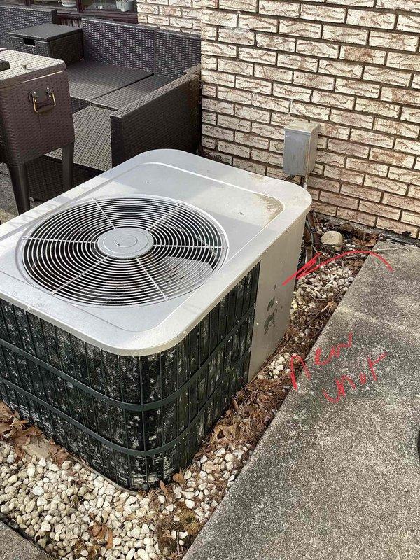 Conducted on-site evaluation for air conditioning system replacement at residential property. Assessed existing outdoor condenser unit positioned on gravel pad against brick exterior wall and inspected indoor furnace/air handler system located in basement utility area. Documented current equipment configuration, measured existing ductwork connections, and photographed both outdoor and indoor HVAC components to provide accurate replacement specifications and ensure proper sizing for new system installation.