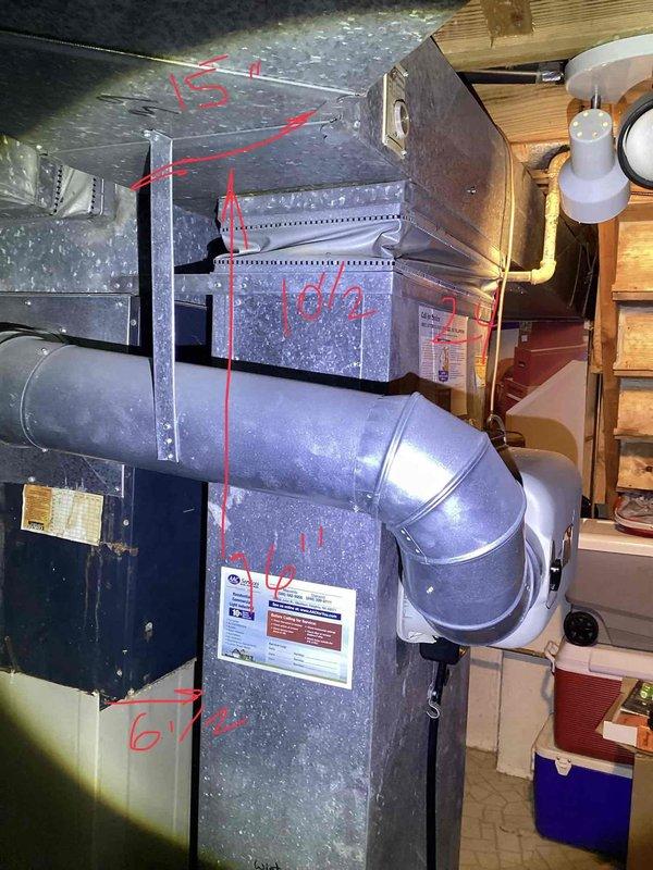 Conducted on-site evaluation for air conditioning system replacement at residential property. Assessed existing outdoor condenser unit positioned on gravel pad against brick exterior wall and inspected indoor furnace/air handler system located in basement utility area. Documented current equipment configuration, measured existing ductwork connections, and photographed both outdoor and indoor HVAC components to provide accurate replacement specifications and ensure proper sizing for new system installation.