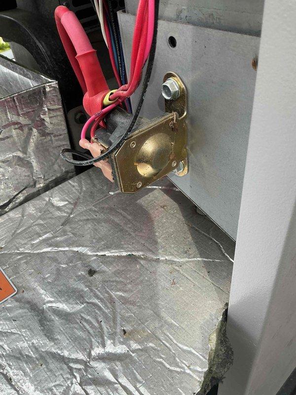 Responded to callback for 12KW Generac generator with flashing blue light. Diagnosed shutdown alarm on Briggs-Stratton GC1032 control panel displaying "Shutdown alarm > Pls clear" message in manual mode. Performed electrical testing on contactor terminals to verify component operation. Starter relay identified as faulty and will require replacement from shop inventory.