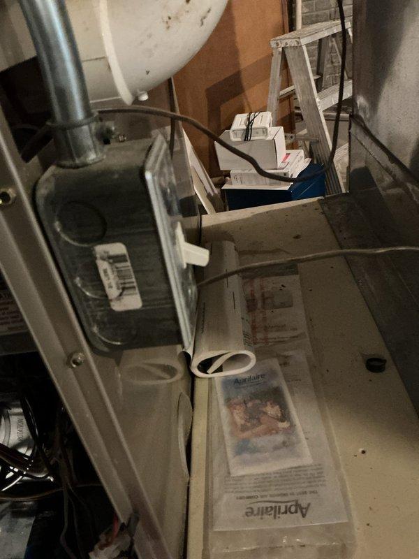 Responded to service call for Bryant Plus 90t furnace in basement unable to maintain setpoint temperature of 71 degrees, with actual temperature remaining at 65-67 degrees. Performed diagnostic evaluation of 3-4 year old unit and examined thermostat operation, air distribution system, and ductwork configuration. Inspected furnace cabinet, condensate drain lines, PVC venting system, and heat exchanger for proper operation. Verified gas supply, ignition sequence, and burner performance. Checked blower motor operation, air filter condition, and airflow throughout the system. Evaluated zone control system interaction with two other furnaces on property to determine if compensation from other units was masking heating deficiency. Assessed duct system for proper sizing, airflow restrictions, and potential heat loss issues affecting lower level temperature maintenance.