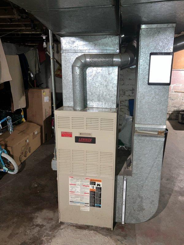 Conducted furnace replacement estimate for a 32-year-old Lennox unit located in basement with failed inducer motor. Evaluated existing system and determined repair costs would approach replacement value given age and condition of equipment. Assessed installation requirements including existing ductwork configuration, basement accessibility, and current thermostat functionality to provide comprehensive replacement options for aging heating system.