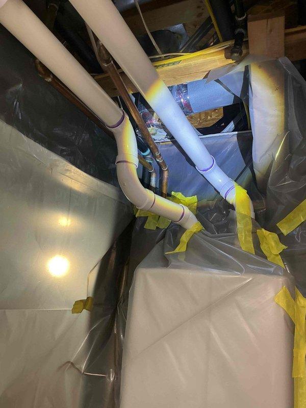 Responded to service call for Navien tankless water heater installed in October 2023 with reported flue pipe leakage and sediment buildup. Upon inspection, discovered improperly capped flue pipe from recent installation causing condensate leakage and mold growth around vent termination. Corrected venting configuration, removed sediment accumulation, cleaned affected areas, and ensured proper drainage and ventilation per manufacturer specifications to prevent future moisture issues.