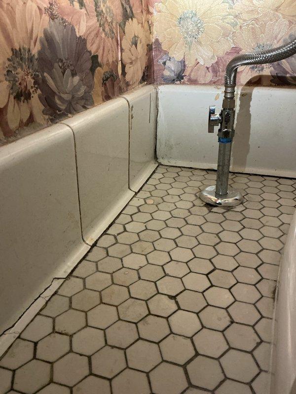 Completed toilet replacement in residential bathroom. Removed existing fixture and installed new one-piece toilet unit supplied by customer. Ensured proper sealing, secure mounting to hexagonal tile floor, and verified all connections for proper operation and leak-free performance.