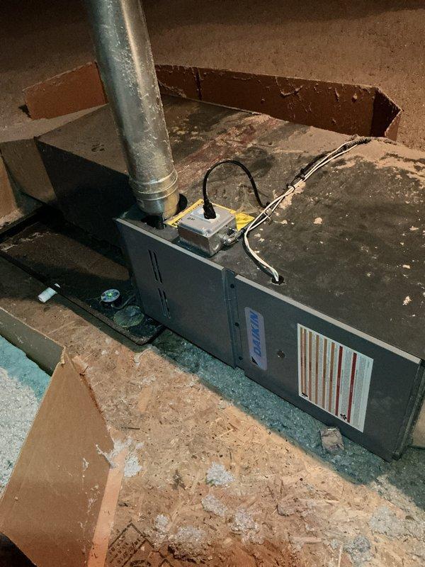 Completed comprehensive Gold Plan AC inspection on Daikin split system with attic-mounted horizontal air handler and exterior condenser unit. Performed full system evaluation including visual inspection of indoor air handler components, ductwork connections, electrical connections, and condensate management in attic location. Inspected outdoor condenser unit for proper operation, cleared debris from surrounding area, verified adequate clearances, examined electrical disconnect and power supply connections at exterior wall. All system components found operating within normal parameters with no immediate service needs identified at time of inspection.