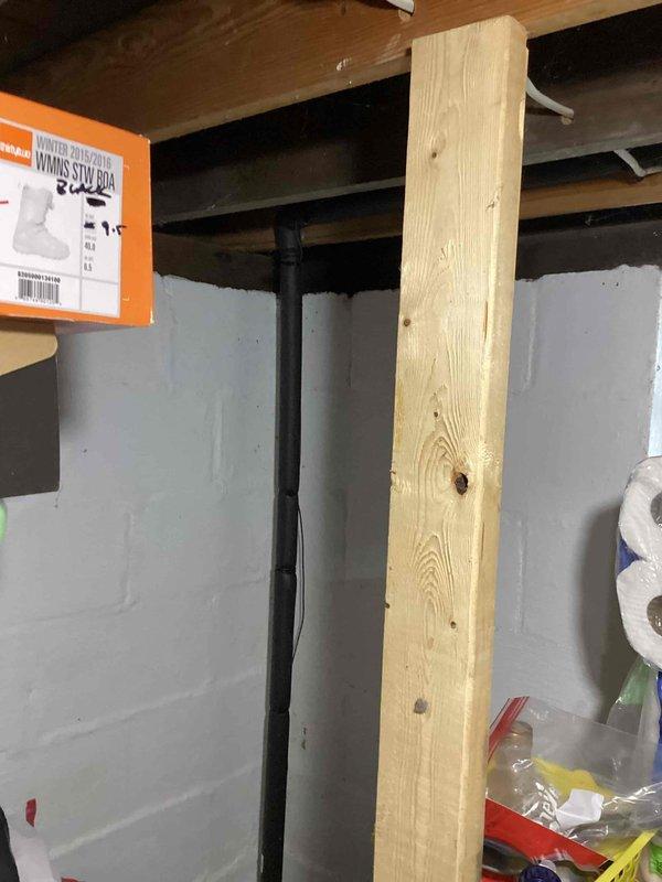 Conducted on-site evaluation for backup generator installation at residential property. Reviewed property plot plan showing home layout, front yard, rear yard, and side yard setback requirements to determine optimal generator placement while maintaining municipal code compliance. Assessed basement utility area and examined existing electrical infrastructure, including main service panel location, structural support posts, floor joists, and available space for transfer switch installation. Documented site conditions through photographs of property diagram and basement electrical service area. Identified appropriate generator placement location considering gas line access, electrical service entry point, and clearance requirements from structure. Evaluated load requirements and existing electrical panel capacity to determine proper generator sizing and automatic transfer switch specifications for whole-house backup power system.