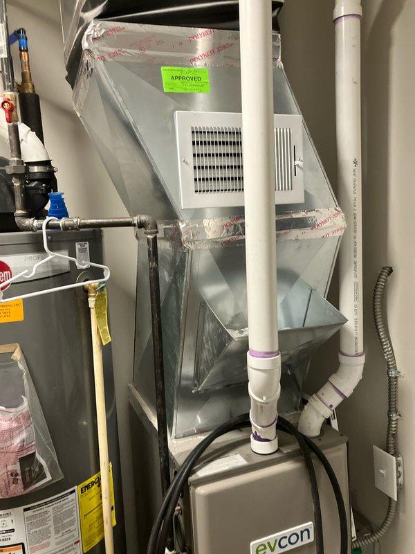 Provided comprehensive estimate for complete HVAC system replacement including air conditioning unit and furnace equipment. Assessed existing interior mechanical room configuration with current furnace/air handler and water heater setup, evaluating ductwork connections, venting requirements, and electrical service capabilities at exterior meter location. Documented equipment specifications and site conditions to prepare detailed replacement proposal for residential comfort system upgrade.