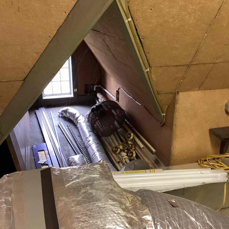 Completed estimate for full Unico system replacement due to recurring equipment failures on 7-year-old unit. Existing Unico system experiencing chronic issues with repair costs approaching replacement threshold. Assessed air handler and coil located in basement along with flexible ductwork configuration. Evaluated attic-mounted components including fan unit, brass fittings, valves, and silver flex duct runs. Documented current system layout and condition through photographic inspection. Verified operational status of existing equipment prior to replacement proposal. Prepared comprehensive replacement estimate for new HVAC system to eliminate ongoing reliability concerns.