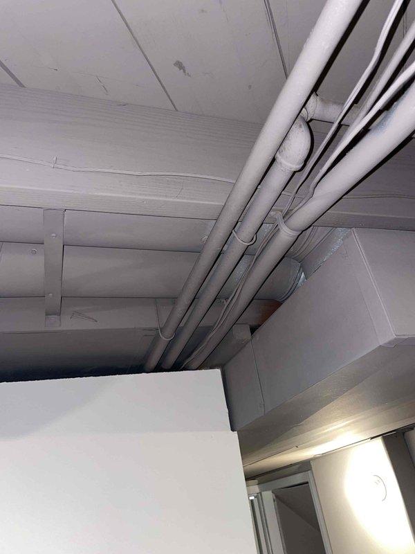 Provided comprehensive estimate for complete AC unit replacement of non-operational system over 10 years old. Evaluated existing air handler installation in attic space with natural gas furnace, assessed copper refrigerant line configuration, and documented current equipment condition including access panels and mounting locations. Prepared detailed quote for new system installation to restore cooling capacity.
