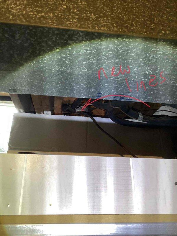 Conducted comprehensive site assessment for complete HVAC system replacement at residential property. Evaluated existing outdoor condensing units showing significant age-related deterioration, dirt accumulation, and weathering on exterior panels. Documented current dual-unit configuration positioned on concrete pads in side yard location. Inspected interior ductwork system and plenum, noting recent electrical line installation along main trunk line. Photographed existing equipment conditions and infrastructure to support full system replacement proposal. Provided detailed quote for new HVAC system installation including equipment specifications and labor requirements.