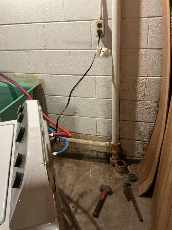 Responded to a partially clogged kitchen sink drain in a 1960s single-family home where water was draining slowly and backing up after initial flow. Accessed the drain system through the cabinet beneath the sink and inspected the P-trap and drain pipe assembly. Removed the existing P-trap components and cleared accumulated debris and buildup causing the blockage. Verified that other household drains were functioning properly, confirming the clog was isolated to the kitchen sink line. Reassembled the drain system with proper connections, tested water flow to ensure complete drainage without backup, and confirmed the issue was fully resolved. Left work area clean with all plumbing fixtures operating normally.