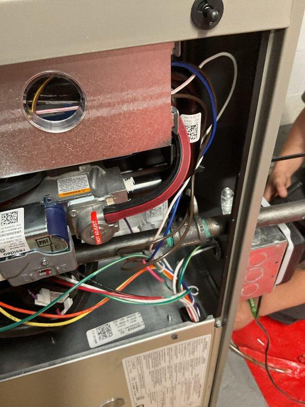 Installed 90,000 BTU high-efficiency furnace with complete mechanical and electrical reconnection. Obtained necessary mechanical and electrical permits prior to installation, verified all wiring connections including line voltage and low-voltage control circuits, confirmed proper gas valve operation, and tested system functionality. Unit qualified for utility energy efficiency rebates upon successful installation and inspection.