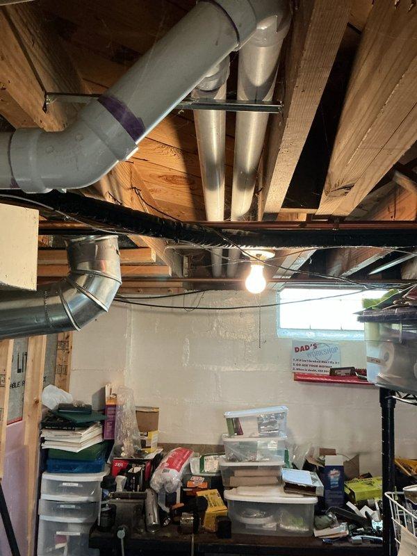 Completed NSP furnace inspection on Daikin unit located in basement utility area. Confirmed inducer motor has been ordered and is available for pickup at Williams Distributing under PO 1303127-001. Unit is accessible without ladder requirement, and all system components, ductwork, and PVC venting were visually inspected and documented with photographs.