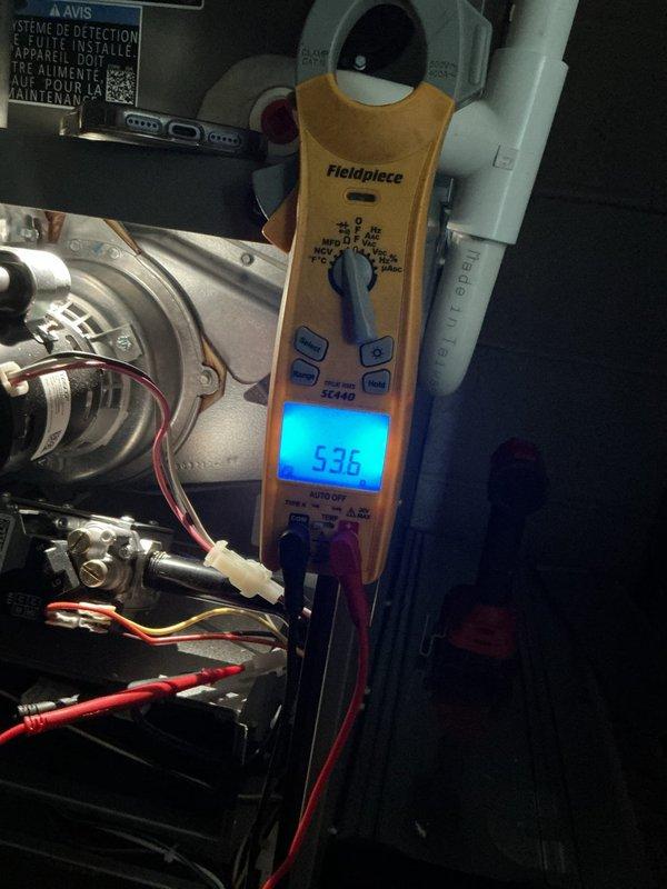Responded to service call for recently installed furnace displaying error code 328 (high limit switch/pressure switch open). Performed diagnostic testing using electrical meter to verify system operation and measured supply/return air temperatures with digital gauges to confirm proper airflow and heat rise across heat exchanger. Verified furnace resumed normal operation with adequate temperature differential between supply and return air, indicating system is heating properly and safely cycling without fault codes present at time of inspection.