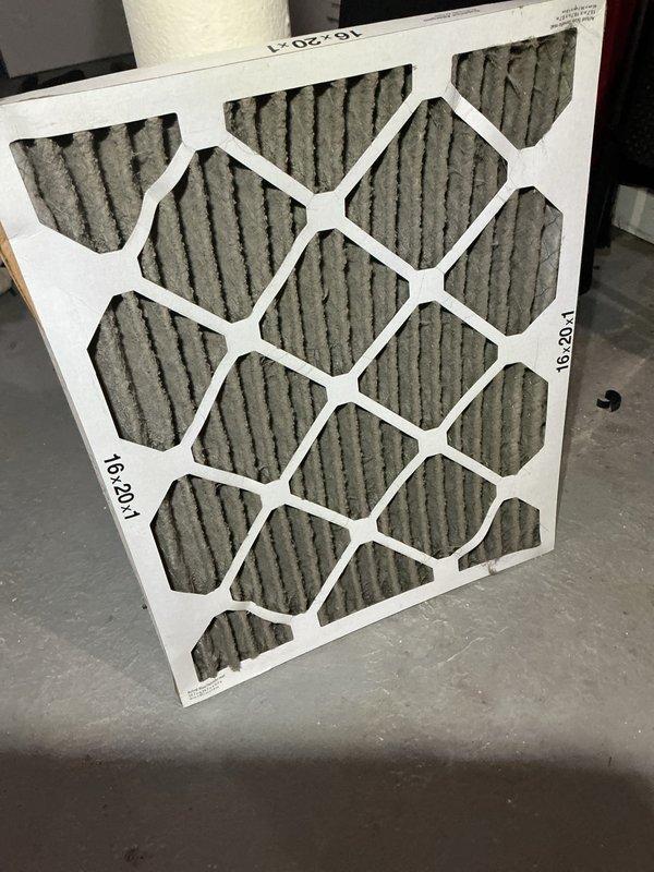 Responded to service call for unusual odor from furnace in basement. Upon inspection, found dirty air filter restricting airflow, which was causing dust accumulation on heat exchanger to produce burning smell when unit cycled on. Replaced 16x20x1 air filter with new unit, verified proper airflow, and tested furnace operation through complete heating cycle with no abnormal odors detected.