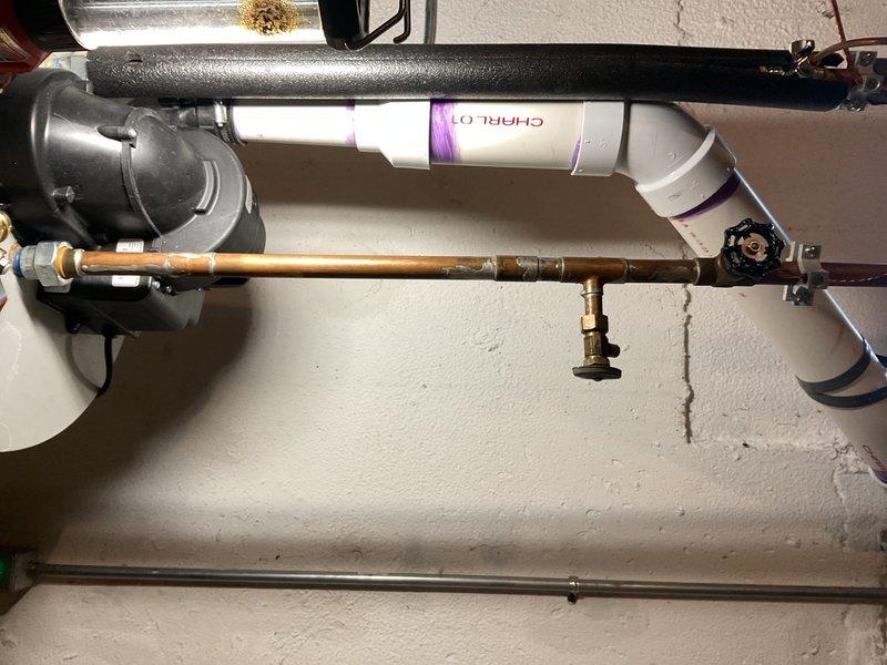 Responded to water leak originating from hot water tank piping connected to humidifier system. Upon inspection, identified active leak at copper pipe connection leading from 3-year-old water heater to whole-house humidifier. Repaired faulty connection, tested system for proper operation and verified no additional leaks present. All plumbing components secured and functioning properly upon completion.