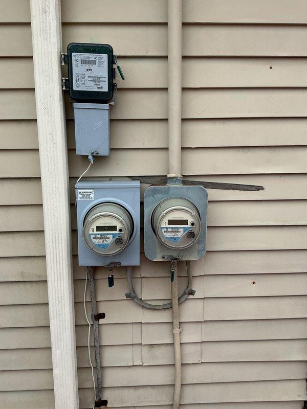 Provided estimate for replacement of 24-year-old furnace and air conditioning system with coil located in basement. Current equipment is operational but nearing end of service life. Documented existing installation and exterior electrical service for proper sizing and installation planning of new HVAC system.