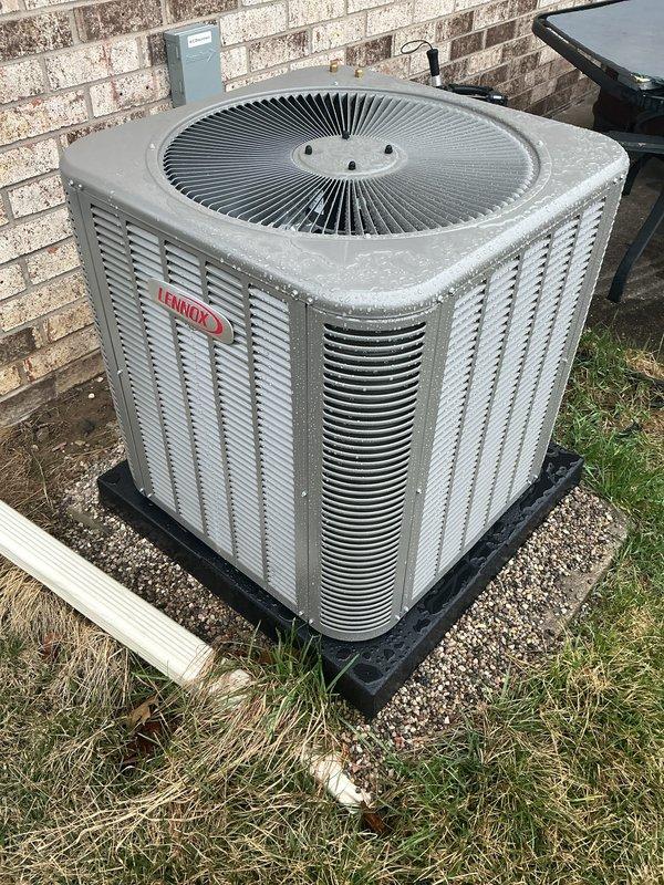 Completed AC system startup on Lennox condenser unit and basement coil installation. Installed required fuses in electrical disconnect that were missing during initial installation and noted by inspector. Verified proper system operation, airflow through condenser louvers, and confirmed all electrical connections are secure and code-compliant.