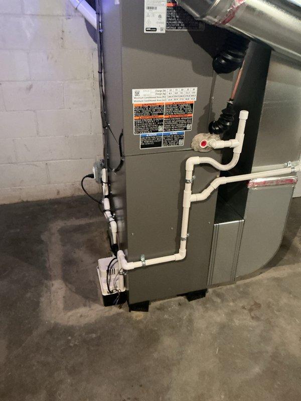 Completed air conditioning system startup on basement evaporator coil installation. Verified proper refrigerant charge, tested airflow through the coil, confirmed condensate drainage through PVC lines, and ensured all electrical connections were secure. System is operating within manufacturer specifications with adequate cooling performance.