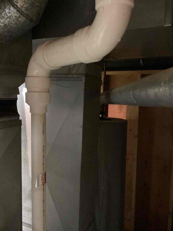 Provided estimate for replacement of gas furnace equipment at residential property with two units - one located in basement mechanical room and one in attic space. Inspected existing basement furnace installation, noting older equipment currently operational but functioning at maximum performance capacity per previous January 2026 inspection findings. Evaluated natural gas furnace system, associated ductwork, venting configuration including PVC exhaust piping, electrical connections, and clearances to water heater and surrounding utilities in confined basement installation area. Documented equipment specifications, mounting locations, and existing infrastructure to prepare comprehensive replacement proposal for both heating units.