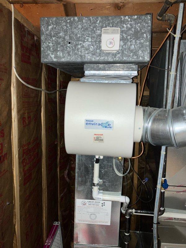Provided comprehensive estimate for replacement of 10+ year old residential air conditioning unit. Existing system currently operational with natural gas furnace, Honeywell Enviracare Elite humidifier, and standard ductwork configuration located in basement utility area. Documented current equipment specifications including air handler, metallic supply plenum, PVC condensate drainage system, and existing humidification components to ensure accurate sizing and compatibility recommendations for new AC unit installation.