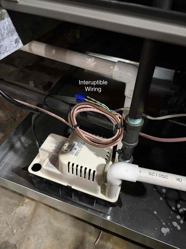Completed AC system start-up following recent installation. Verified proper electrical connections at contactor assembly, confirmed interruptible wiring configuration, and inspected condensate drain line connections. System tested and operational with all components functioning within manufacturer specifications.
