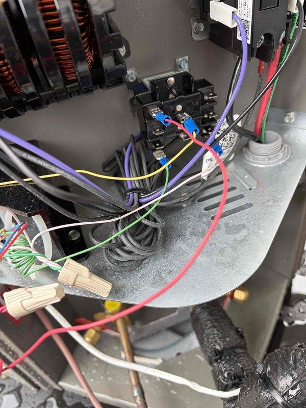 Completed AC system start-up following recent installation. Verified proper electrical connections at contactor assembly, confirmed interruptible wiring configuration, and inspected condensate drain line connections. System tested and operational with all components functioning within manufacturer specifications.