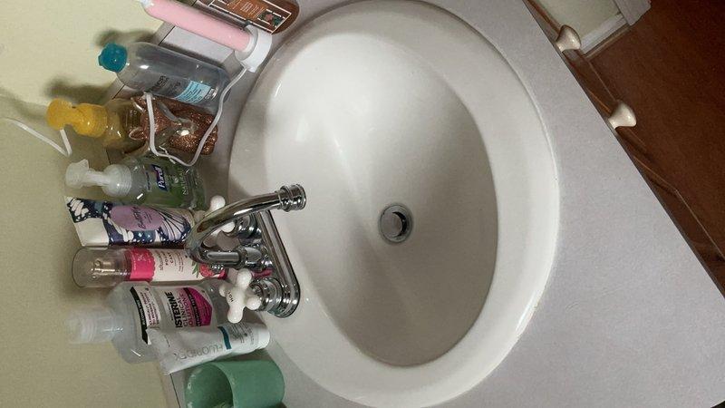 Conducted on-site assessment for installation quote of two bathroom sinks and three toilets. Inspected existing plumbing infrastructure, including under-cabinet drainage systems with P-trap configurations and supply line connections with chrome shut-off valves. Evaluated installation requirements for additional fixtures, photographed current sink installations with single-handle chrome faucets and documented existing plumbing connections to provide accurate material and labor estimates for the requested fixture installations.