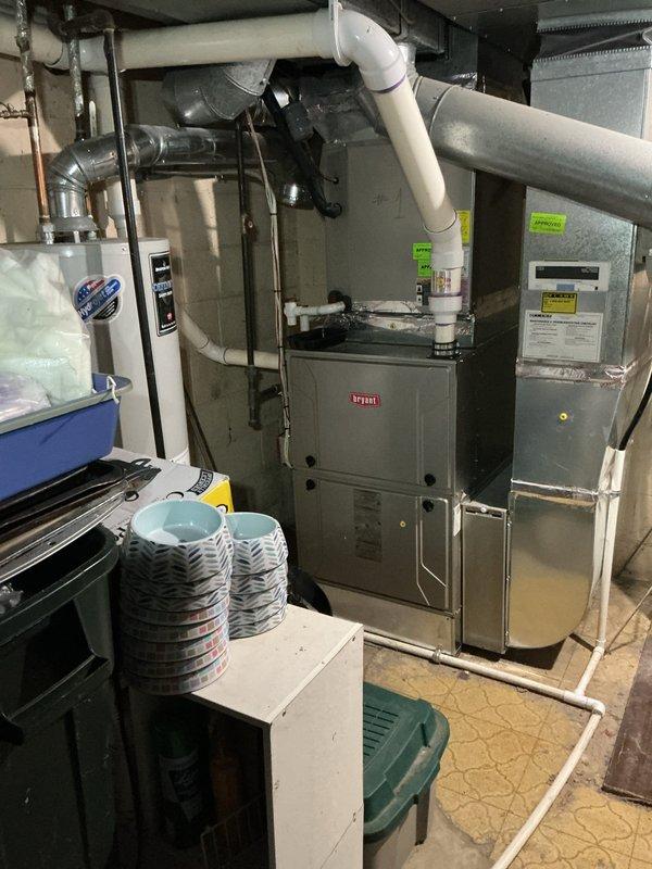 Responded to no heat call on 2017 Bryant furnace where blower was running but unit failed to produce heat following recent service. Diagnosed failed ignition system preventing burner assembly from lighting. Replaced faulty ignitor and verified proper flame sensor operation, restoring full heating function to unit.