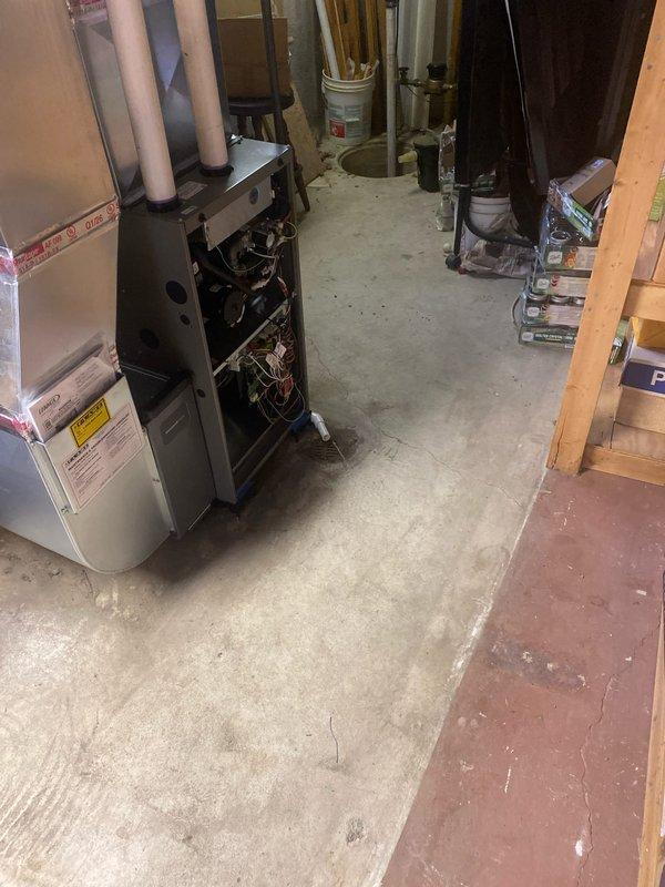 Completed full furnace replacement installing a new 70,000 BTU unit in basement utility room. Installation included humidifier integration, flue liner replacement, and reconnection of all ductwork and electrical systems. Permit was requested and consumers energy rebate documentation submitted for $300 qualification.
