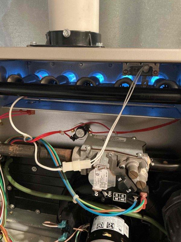 Replaced inducer motor on gas heating system. Verified proper burner operation with visible blue flame pattern across burner assembly. Performed combustion analysis using digital analyzer, confirming oxygen levels at 8.4%, carbon monoxide at 28 PPM, and stack temperature at 37.9°F. All system components tested and operating within manufacturer specifications.