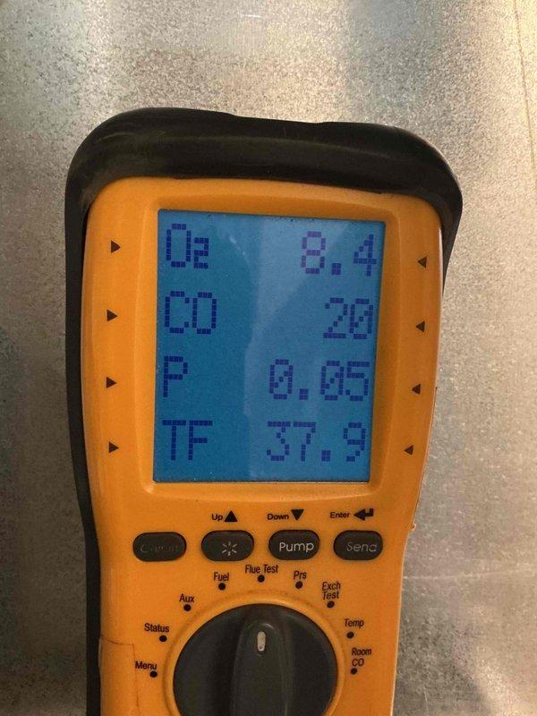 Replaced inducer motor on gas heating system. Verified proper burner operation with visible blue flame pattern across burner assembly. Performed combustion analysis using digital analyzer, confirming oxygen levels at 8.4%, carbon monoxide at 28 PPM, and stack temperature at 37.9°F. All system components tested and operating within manufacturer specifications.