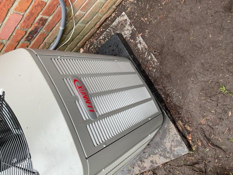 Completed installation of two 4-ton air conditioning systems with matching evaporator coils utilizing two installation crews. First outdoor condensing unit positioned on concrete pad in rear yard area adjacent to brick exterior wall with proper clearances maintained. Second system installed with indoor air handler and coil assembly in interior utility space with Maytag furnace integration. Refrigerant lines run with appropriate insulation, PVC condensate drainage piping installed and routed to proper termination points, electrical connections completed including disconnect boxes and proper wire sizing. All systems pressured tested for leaks, evacuated, and charged to manufacturer specifications. Units powered up, tested for proper operation including temperature split verification, airflow confirmation, and safety control functionality. Installation completed per code requirements with all reconnections finalized and systems operational.