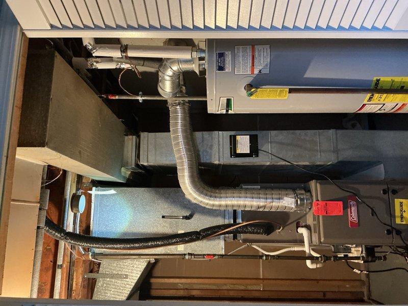 Responded to service call for reported gas odor at furnace location. Gas utility had previously identified a small gas leak at a coupling above the furnace unit. Inspected gas piping connections, located the leaking coupling joint, shut off gas supply, and tightened the faulty connection. Performed leak detection test using soap solution to verify repair integrity, then restored gas service. Conducted operational test of furnace to confirm proper ignition sequence and burner operation. System returned to normal heating function with no further gas odor detected.