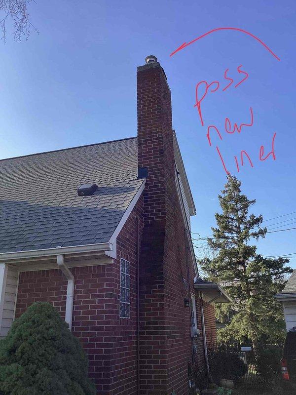 Responded to no-heat call where thermostat displayed error code on 14-year-old furnace located in basement. Diagnosed failed heat exchanger requiring full unit replacement. Provided comprehensive replacement estimate and documented exterior conditions including chimney requiring possible new liner and existing PVC vent termination through brick wall.