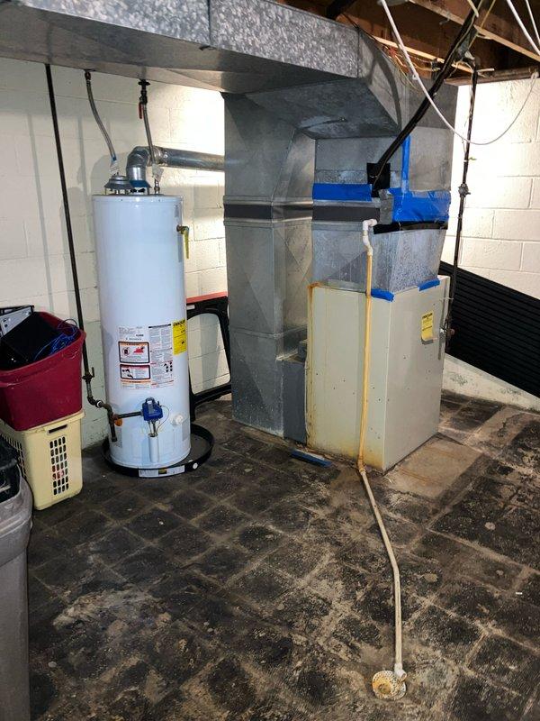 Conducted comprehensive full system HVAC evaluation of 20-year-old residential heating equipment located in basement utility area. System assessment determined unit has reached end of serviceable life, and complete replacement was recommended to ensure continued reliable operation and efficiency.