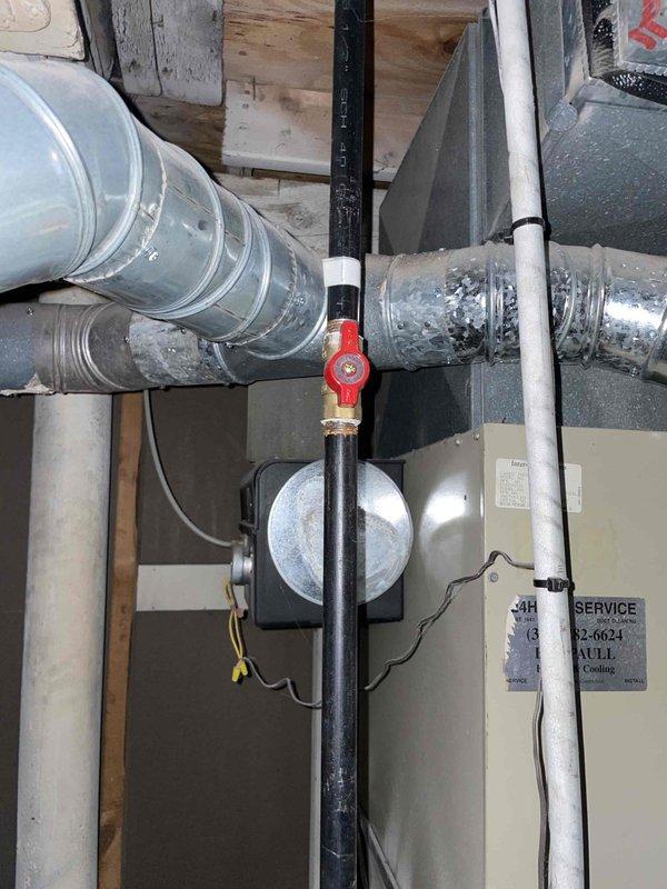 Conducted site assessment for new air conditioning system installation in residential property currently without cooling equipment. Evaluated existing natural gas furnace, ductwork infrastructure, and electrical panel capacity to determine compatibility and requirements for AC addition. Documented mechanical room layout, including existing HVAC components, gas piping with shutoff valve, flexible and rigid ductwork configuration, and available electrical service for new equipment integration.