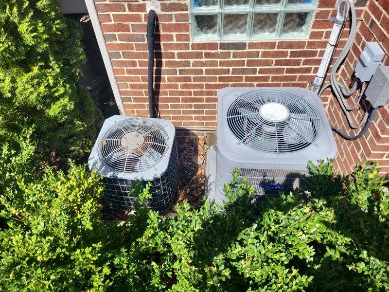 Provided comprehensive estimate for replacement of two natural gas furnaces and one air conditioning system in basement installation. Existing equipment operational but over 10 years old and approaching end of service life. Evaluated current Carrier furnace setup with associated ductwork, air handler, and refrigerant lines, along with two outdoor condenser units mounted on exterior brick wall. Assessment included review of gas supply configuration, electrical connections, duct distribution system, and condensate drainage requirements for complete system replacement recommendation.