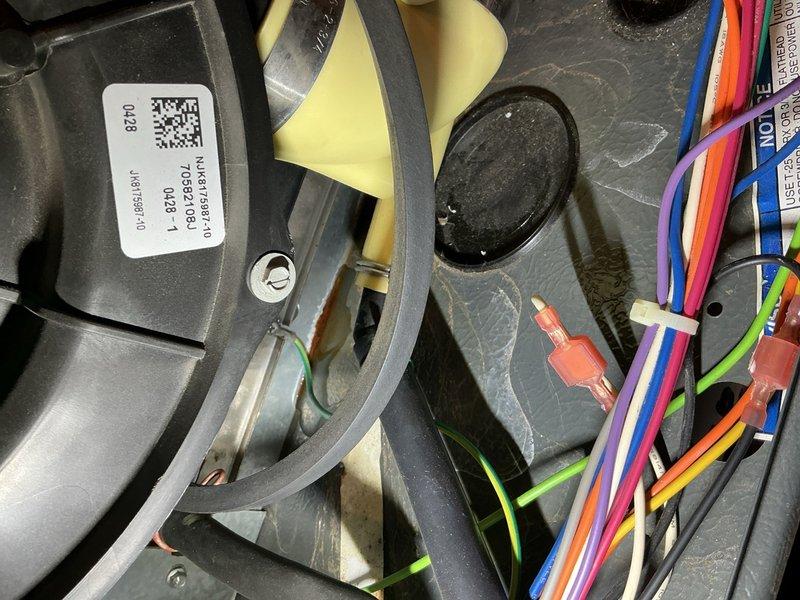 Responded to no heat call for furnace located in upstairs bedroom closet. Upon inspection, found unit powering on but failing to produce adequate heat. Accessed blower assembly and discovered significant dust accumulation on centrifugal fan blades and housing components affecting airflow efficiency. Inspected electrical connections and wiring harness, confirming all wire terminals and connectors were secure with no visible damage. Examined inducer motor assembly and verified proper operation. Cleaned blower wheel and housing to restore optimal air circulation. Checked all safety controls and limit switches for proper function. System tested and confirmed return to normal heating operation with proper temperature rise across heat exchanger.
