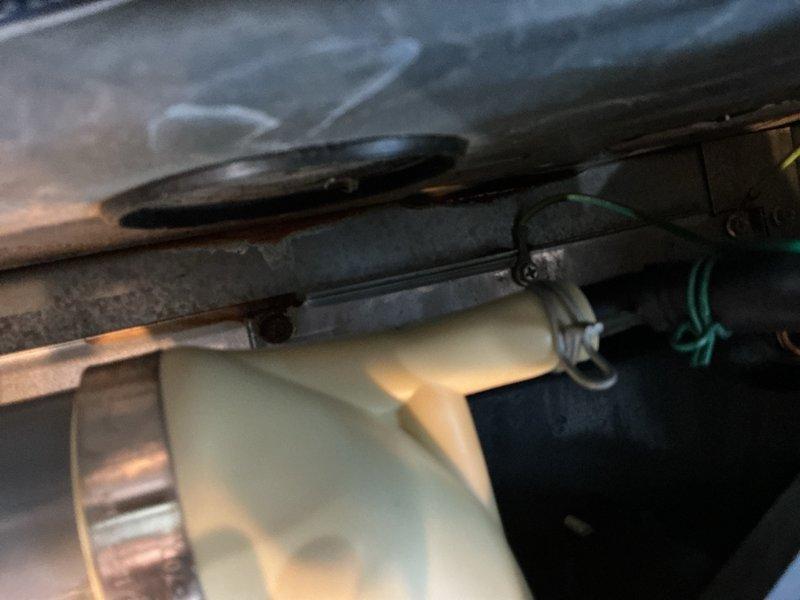 Responded to no heat call for furnace located in upstairs bedroom closet. Upon inspection, found unit powering on but failing to produce adequate heat. Accessed blower assembly and discovered significant dust accumulation on centrifugal fan blades and housing components affecting airflow efficiency. Inspected electrical connections and wiring harness, confirming all wire terminals and connectors were secure with no visible damage. Examined inducer motor assembly and verified proper operation. Cleaned blower wheel and housing to restore optimal air circulation. Checked all safety controls and limit switches for proper function. System tested and confirmed return to normal heating operation with proper temperature rise across heat exchanger.