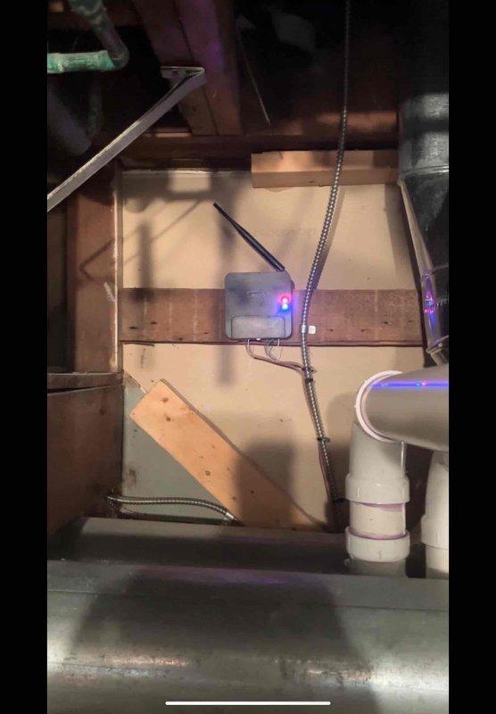 Responded to no-heat call on four-year-old Lennox furnace system with communication error between smart thermostat and heating unit. Diagnosed Alert Code 11 indicating missing device communication on Lennox iComfort thermostat. Inspected furnace control board and wiring connections in mechanical space, identified failed communication module with blue LED indicator light mounted on furnace platform. Replaced defective communication interface module, restored proper signal transmission between thermostat and furnace control system, and verified system operation with successful heat call.