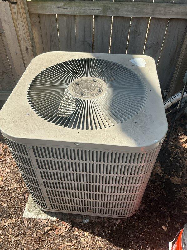 Completed comprehensive Gold AC inspection on residential split system with basement air handler configuration. Performed full system evaluation on Rheem condensing unit, including visual inspection of exterior housing, fan assembly operation, refrigerant line connections, and electrical components. Verified proper airflow through condenser coils, checked fan guard integrity, and confirmed unit is operating within normal parameters. Inspected installation pad condition and surrounding area for adequate clearance and drainage. System shows normal wear consistent with age, with unit maintaining proper function and no immediate service concerns identified. All components inspected and found to be in satisfactory working condition.