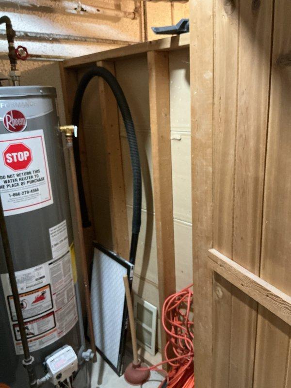 Conducted on-site evaluation for complete HVAC system replacement including furnace and air conditioning unit. Assessed existing natural gas furnace located in basement closet and air conditioning condenser positioned in backyard, both units significantly aged and nearing end of service life. Documented current system configuration, ductwork routing through attic space with fiberglass insulation between joists, and existing utility infrastructure including water heater proximity to furnace location. Verified furnace currently operational while air conditioner remained untested for current season. Photographed installation areas, structural access points, and existing mechanical room layout to develop comprehensive replacement proposal for new high-efficiency heating and cooling equipment.