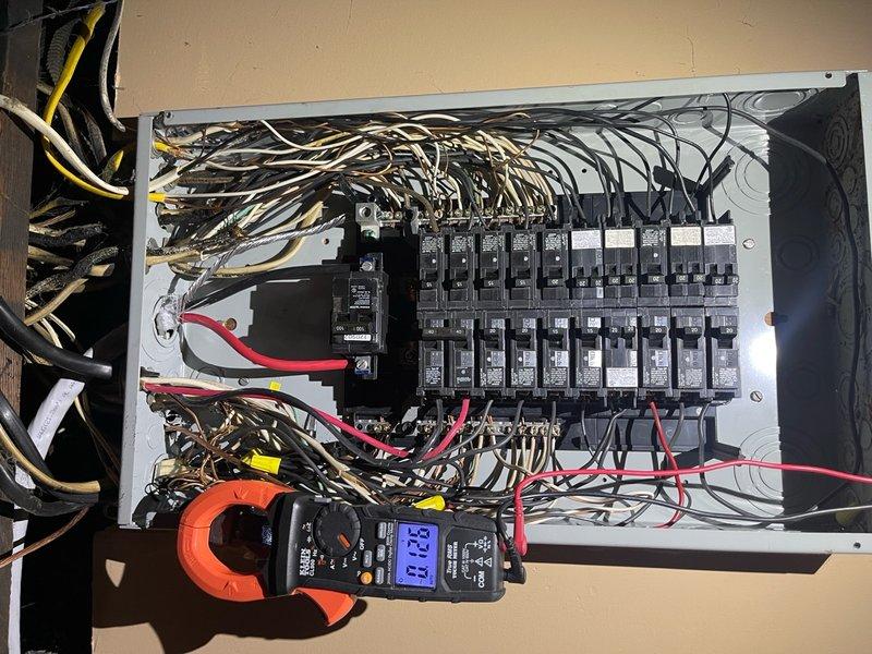 Replaced deteriorated lower service cable feeding main electrical panel. Removed old service entrance conductors and installed new appropriately-sized cable from meter base to main distribution panel. Verified proper torque connections at all termination points and confirmed correct polarity. Tested electrical loads with clamp meter to ensure balanced distribution across phases and verified system integrity upon restoration of power.