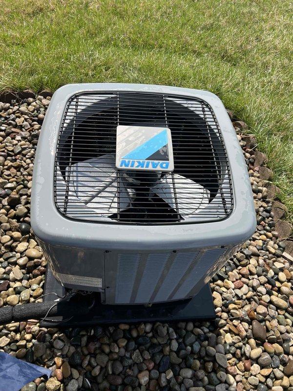 Completed comprehensive Gold AC Inspection on 7-year-old Daikin air conditioning system with outdoor condenser unit and attic-mounted air handler. Performed full system evaluation including refrigerant level check, electrical connection inspection, condensate drain verification, and filter assessment. All components operating within normal parameters; no deficiencies noted at time of service.